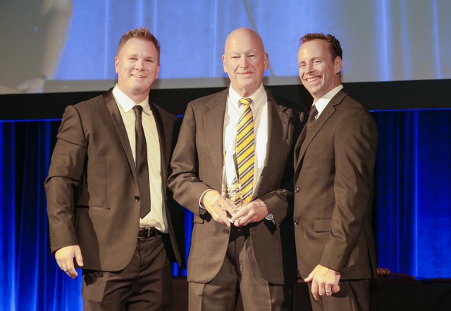 Rich Penrose receiving medal